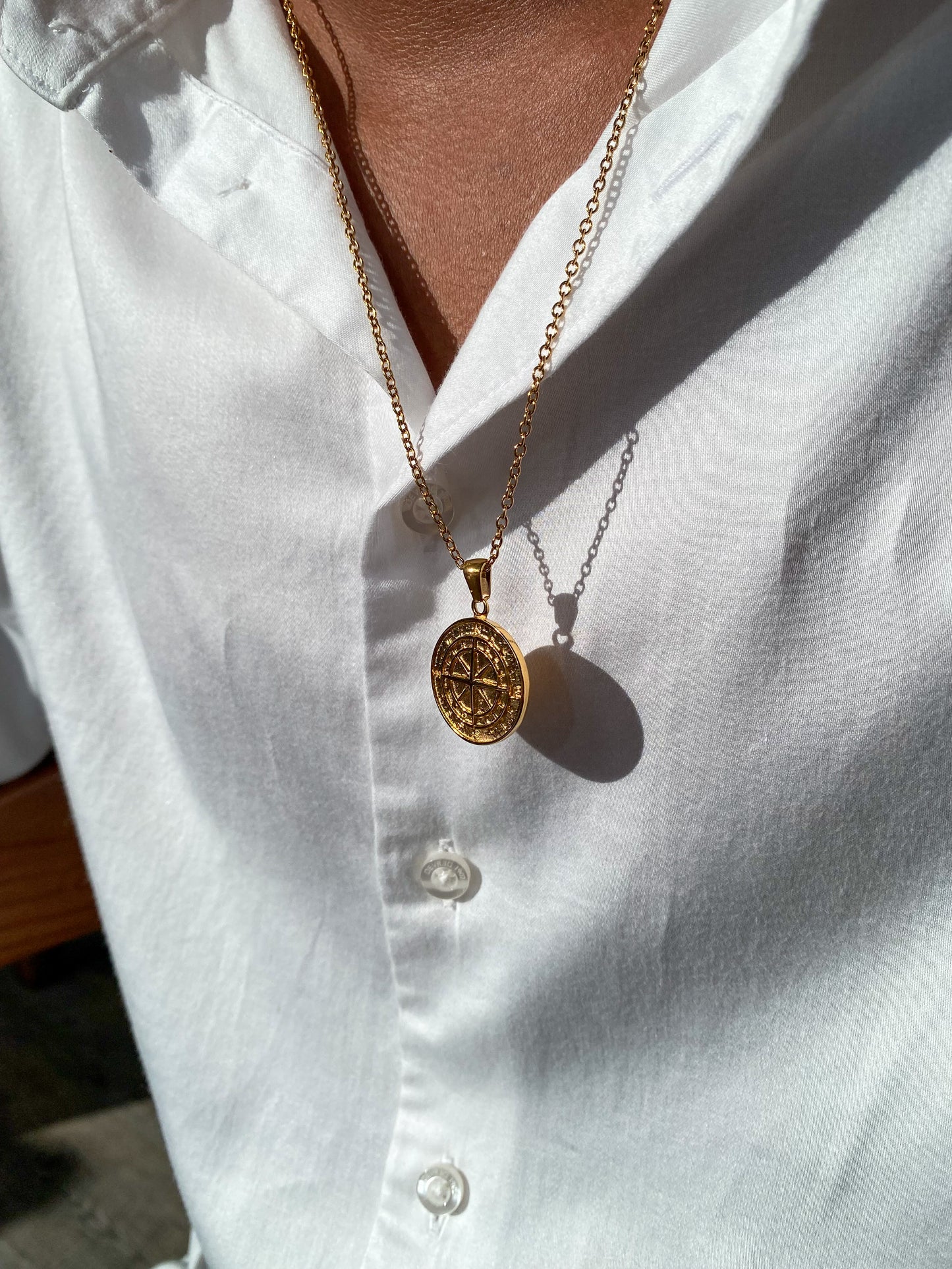 Pendentif boussole