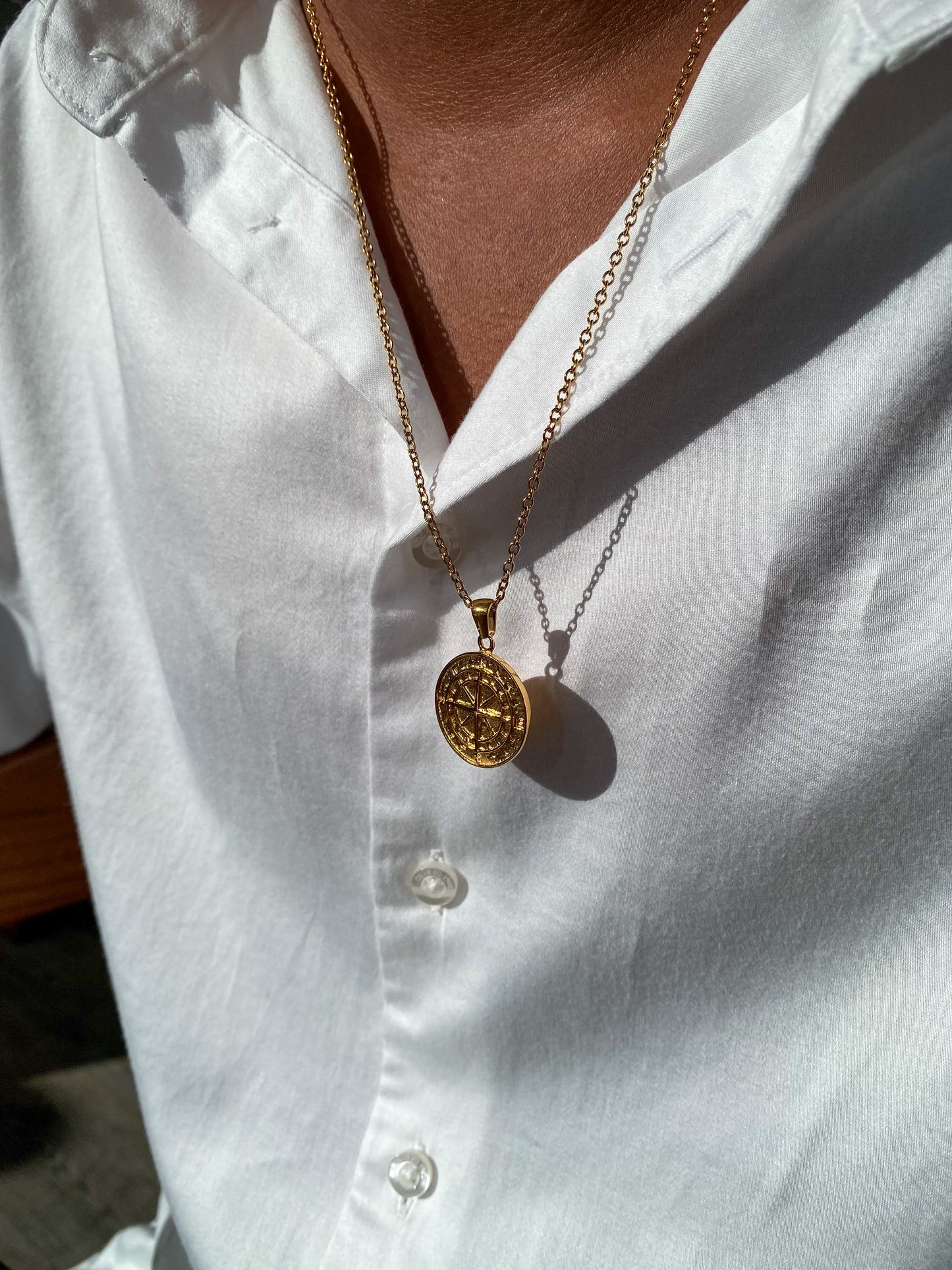 Pendentif boussole