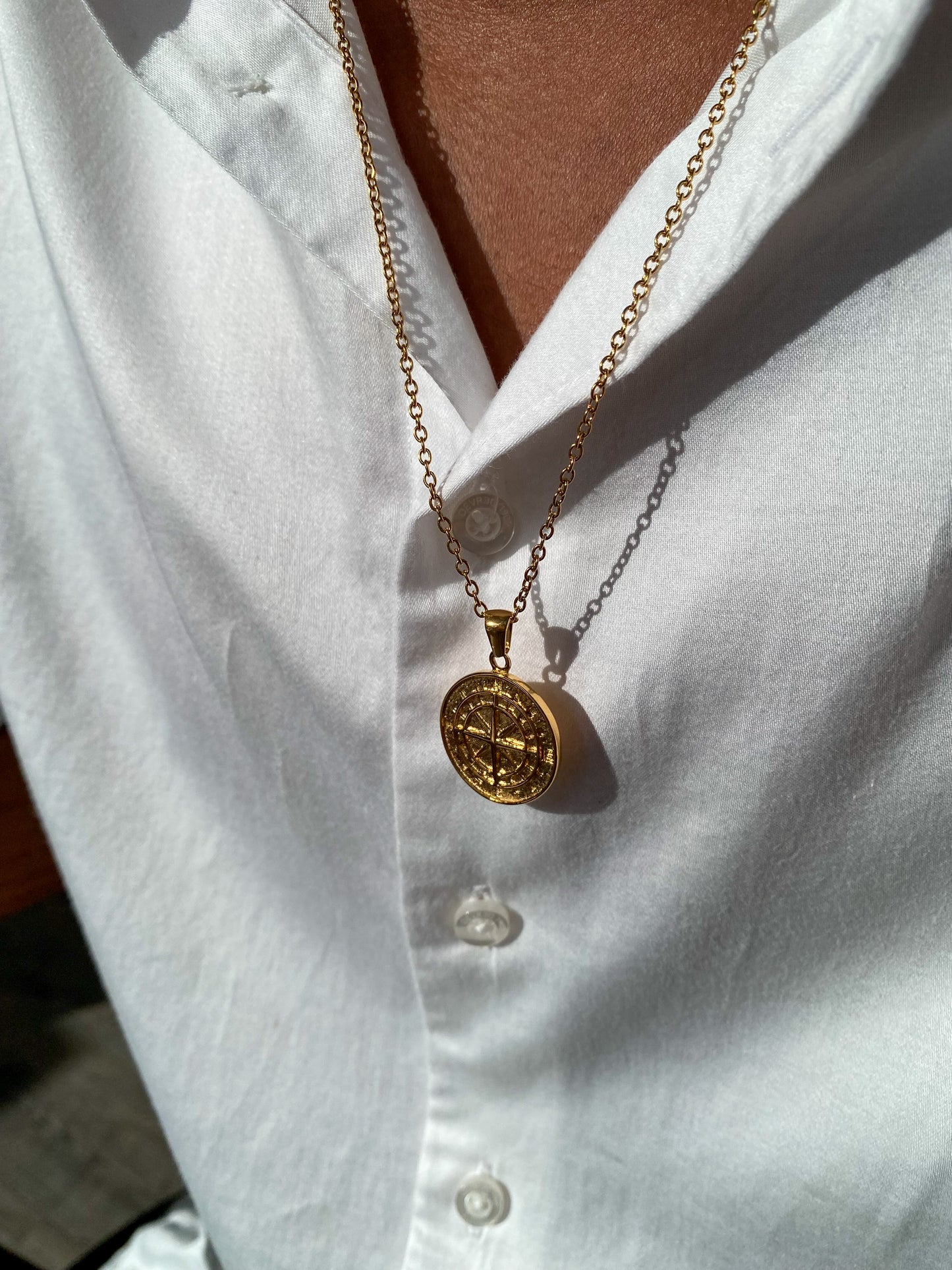 Pendentif boussole